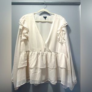 Brand new cream ruffled sleeve